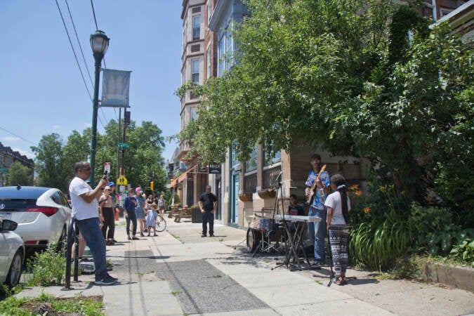 The Youth Family Band performed on Baltimore Avenue for West Philly Porchfest on June 4, 2022. (Kimberly Paynter/WHYY)