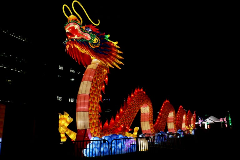 The 200-foot-long, 21-foot-high dragon lantern glows red in the dark.