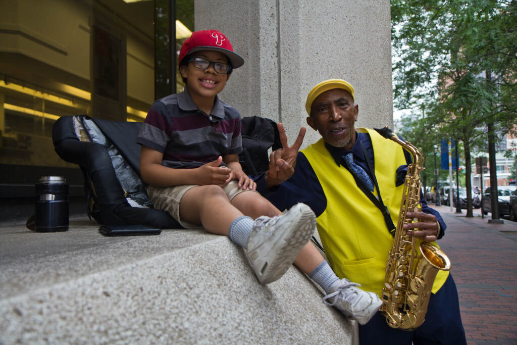 David Puryear (right) with his son Abdul on 4th and Market streets