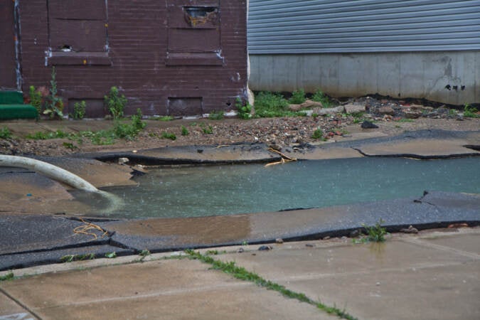 The scene of a water main break at Fourth and Hewson streets