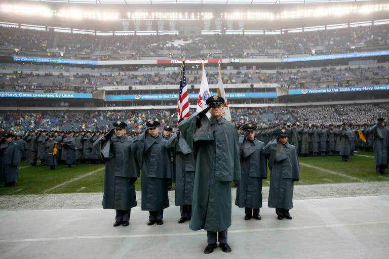 Army cadets salute before an NCAA college football game against Navy, Saturday, Dec. 14, 2019, in Philadelphia. (AP Photo/Matt Slocum)