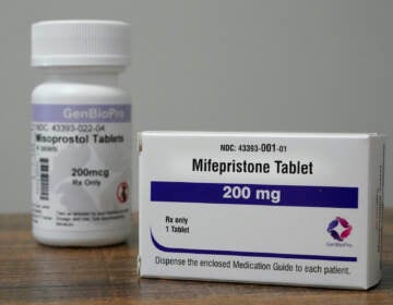 Containers of the medication used to end an early pregnancy sit on a table inside a Planned Parenthood clinic Friday, Oct. 29, 2021, in Fairview Heights, Ill. Women with unwanted pregnancies are increasingly considering getting abortion pills by mail. (AP Photo/Jeff Roberson)