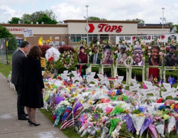 Vice President Kamala Harris and her husband Doug Emhoff visit a memorial near the site of the Buffalo supermarket shooting after attending a memorial service for Ruth Whitfield, one of the victims of the shooting, Saturday, May 28, 2022, in Buffalo, N.Y. (AP Photo/Patrick Semansky)