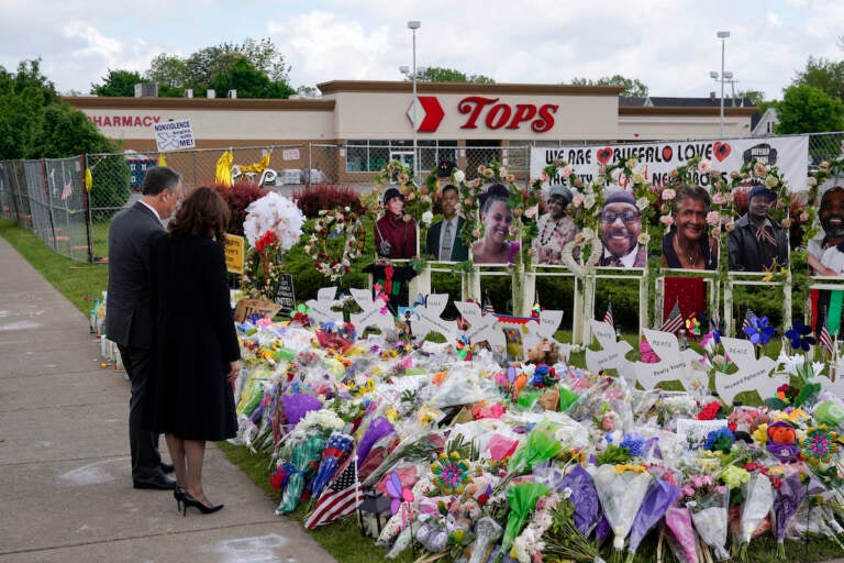 Vice President Kamala Harris and her husband Doug Emhoff visit a memorial near the site of the Buffalo supermarket shooting after attending a memorial service for Ruth Whitfield, one of the victims of the shooting, Saturday, May 28, 2022, in Buffalo, N.Y. (AP Photo/Patrick Semansky)