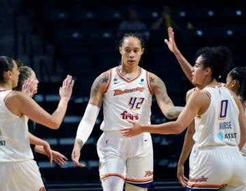 File photo: Phoenix Mercury's Brittney Griner (42) is congratulated on a play against the Seattle Storm in the first half of the second round of the WNBA basketball playoffs Sunday, Sept. 26, 2021, in Everett, Wash. Brittney Griner has been able to receive emails and letters from WNBA players to an account Griner’s agent set up to allow them to communicate with her. The emails are printed out and delivered sporadically in bunches to Griner by her lawyers after being vetted by Russian officials