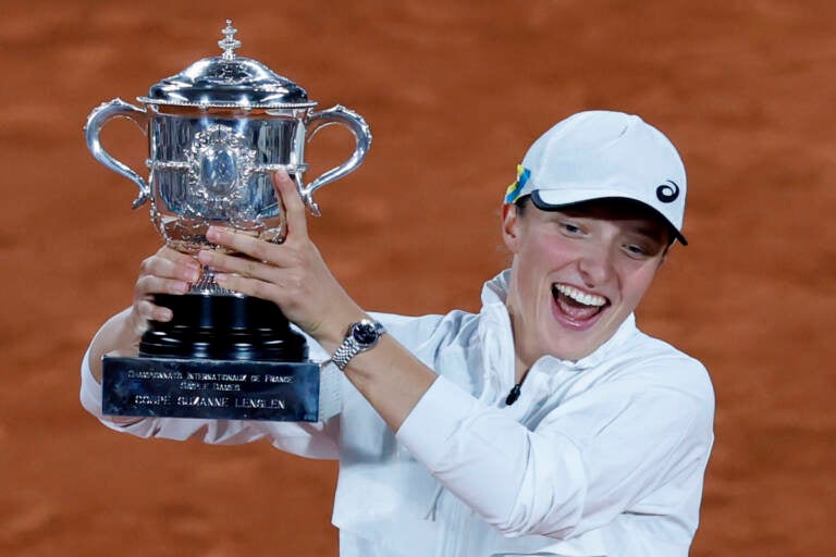 Poland's Iga Swiatek celebrates with the cup after defeating Coco Gauff of the U.S.in their final of the French Open tennis tournament at the Roland Garros stadium Saturday, June 4, 2022 in Paris. (AP Photo/Jean-Francois Badias)