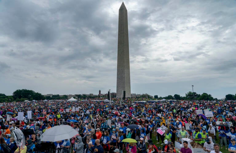 People participate in the second March for Our Lives rally in support of gun control in front of the Washington Monument, Saturday, June 11, 2022, in Washington. (AP Photo/Gemunu Amarasinghe)