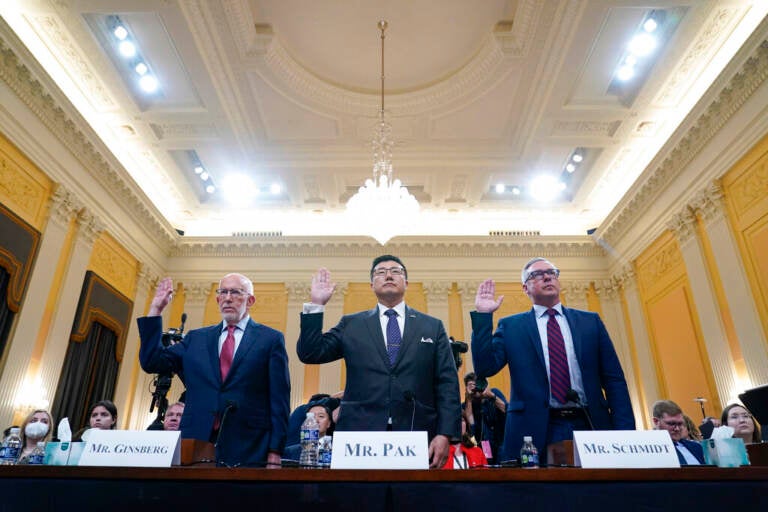 Benjamin Ginsberg, Washington attorney and elections lawyer, left, BJay Pak, former U.S. Attorney in Atlanta, center, and Al Schmidt, former city commissioner of Philadelphia, are sworn in to testify as the House select committee investigating the Jan. 6 attack on the U.S. Capitol continues to reveal its findings of a year-long investigation, at the Capitol in Washington, Monday, June 13, 2022. (AP Photo/Susan Walsh)