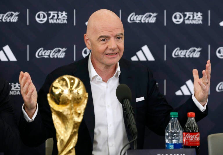 FIFA President Gianni Infantino answers questions during a 2026 soccer World Cup news conference Thursday, June 16, 2022, in New York. (AP Photo/Noah K. Murray)