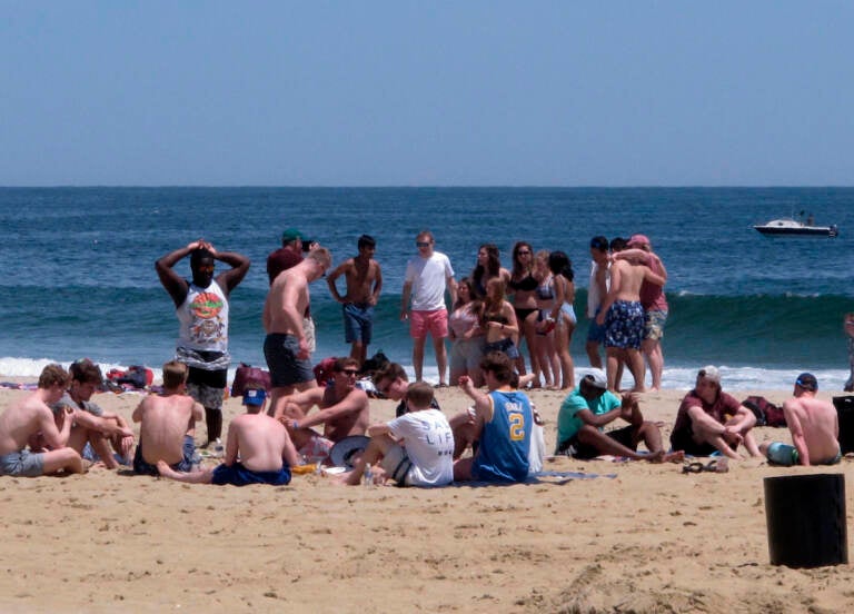File photo: Beachgoers enjoy an afternoon on the sand in Point Pleasant Beach,N.J. (AP Photo/Wayne Parry)