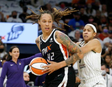 File photo: Phoenix Mercury center Brittney Griner (42) drives past Chicago Sky forward Candace Parker (3) during the first half of Game 1 of the WNBA basketball Finals, Sunday, Oct. 10, 2021, in Phoenix. (AP Photo/Ralph Freso, File)