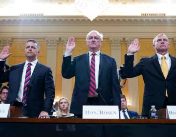 Steven Engel, former Assistant Attorney General for the Office of Legal Counsel, from left, Jeffrey Rosen, former acting Attorney General, and Richard Donoghue, former acting Deputy Attorney General, are sworn in to testify as the House select committee investigating the Jan. 6 attack on the U.S. Capitol continues to reveal its findings of a year-long investigation, at the Capitol in Washington, Thursday, June 23, 2022. (AP Photo/Jacquelyn Martin)