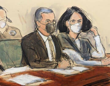 In this courtroom sketch, Ghislaine Maxwell, right, is seated beside her attorney, Christian Everdell, as they watch the prosecutor speak during her sentencing, Tuesday, June 28, 2022, in New York. (AP Photo/Elizabeth Williams)