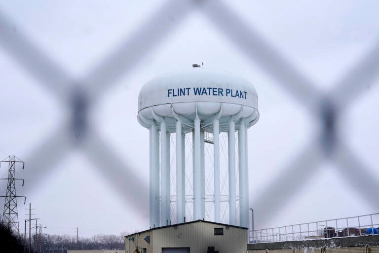 File photo: The Flint water plant tower is seen, Thursday, Jan. 6, 2022, in Flint, Mich. (AP Photo/Carlos Osorio, File)