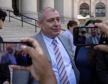 Lev Parnas, center, speaks to the media outside the federal courthouse in New York, Wednesday, June 29, 2022.  (AP Photo/Yuki Iwamura)