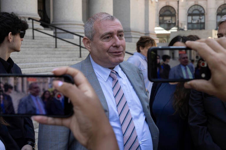 Lev Parnas, center, speaks to the media outside the federal courthouse in New York, Wednesday, June 29, 2022.  (AP Photo/Yuki Iwamura)