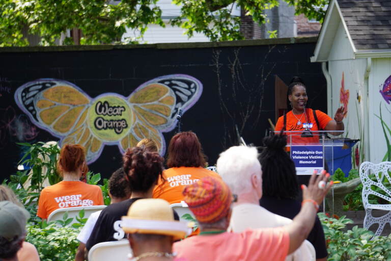 The Gun Violence Victims Memorial opens with a cover of ''Beautiful,'' by Mali Music. (Sam Searles/WHYY) 