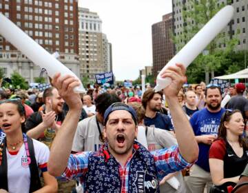 File photo: Soccer fans celebrate in Love Park as Philadelphia is named to host the 2026 World Cup. (Emma Lee/WHYY)