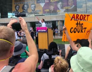 Josh Shapiro addresses a crowd of hundreds of people, rallying in defense of abortion rights at Philadelphia’s National Constitution Center on June 25, 2022. (Emily Rizzo/WHYY)