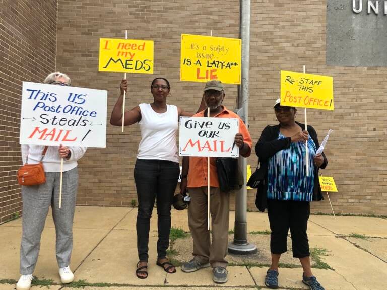 Residents of the Wood Norton apartment complex in Germantown, protested outside their local post office on Saturday morning. Until June 10, they had not received their mail in a month. (Emily Rizzo/WHYY)