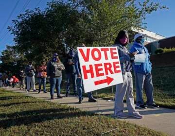 Voters line up to cast their ballots in the 2020 presidential election in Durham, N.C. The U.S. Supreme Court has agreed to hear a North Carolina redistricting case this fall about how much power state legislatures have over how federal elections are run. (Gerry Broome/AP)