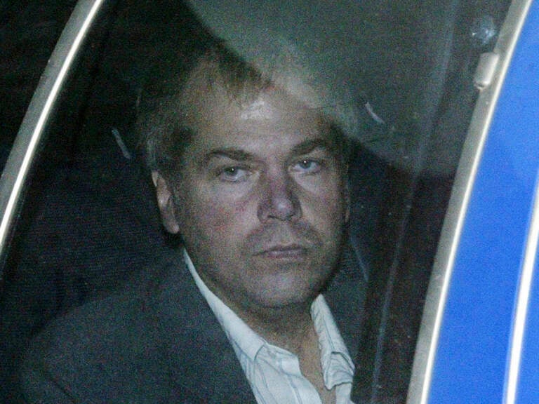 File photo: John Hinckley Jr., pictured in November 2003, arrives at U.S. District Court in Washington. As of Wednesday, President Ronald Reagan's would-be assassin is no longer under court-mandated legal or mental health supervision. (Evan Vucci/AP)