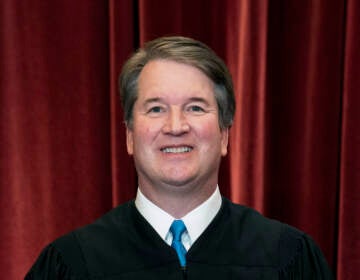 Associate Justice Brett Kavanaugh stands during a group photo at the Supreme Court in Washington last year. (Erin Schaff/AP)