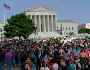 Abortion rights activists protest outside of the U.S. Supreme Court in Washington on May 3, a day after the leak of a draft opinion suggesting a possible reversal of Roe v. Wade. (Jose Luis Magana/AP)
