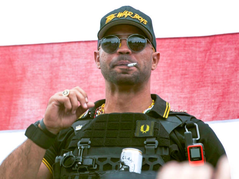 Proud Boys leader Henry 'Enrique' Tarrio wears a hat that says The War Boys during a rally in Portland, Ore., Sept. 26, 2020. (Allison Dinner/AP)