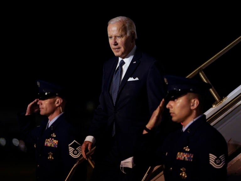President Biden walks down the steps of Air Force One at Dover Air Force Base, Del., Thursday, June 2, 2022, as he heads to Rehobeth Beach, Del., for the weekend. A small plane flew near the Bidens' beach house. (Susan Walsh/AP)