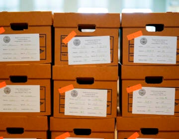 Boxes of recounted ballots from the recent Pennsylvania primary election are stacked at the Chester County Voter Services office in West Chester, Pa., Wednesday, June 1, 2022. (AP Photo/Matt Rourke)