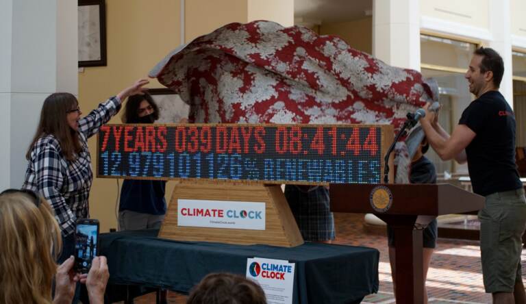 Karen Feridun and Greg Schwedock unveil the climate clock