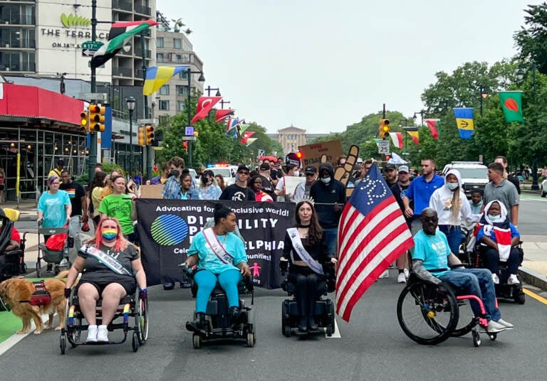 Karli Miller (Ms. Wheelchair Pennsylvania 2020), Domonique Howell (Ms. Wheelchair Pennsylvania 2022 1st Runner Up) , Anomie Fatale (me/Ms. Wheelchair Pennsylvania USA 2022), and Tony Brooks (of ADAPT). (Courtesy of Anomie Fatale)