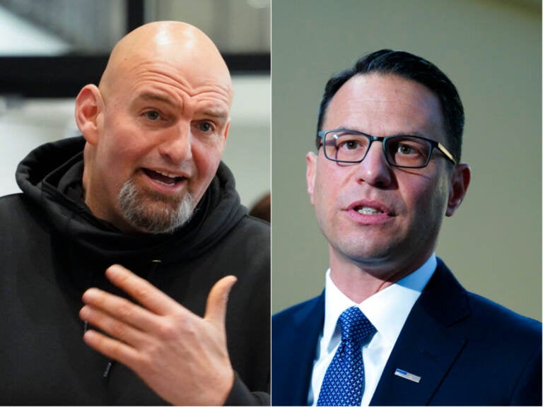 John Fetterman, on the left, gestures as he's speaking. Josh Shapiro, on the right, appears to be speaking as well.