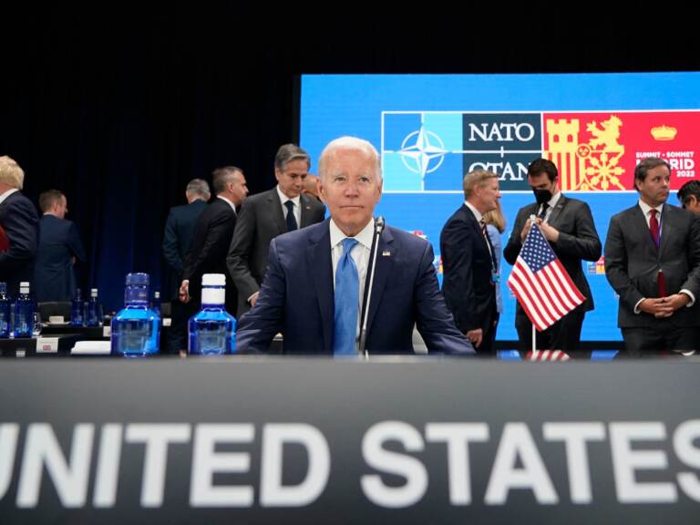 President Joe Biden waits for the start of a roundtable meeting at a NATO summit in Madrid