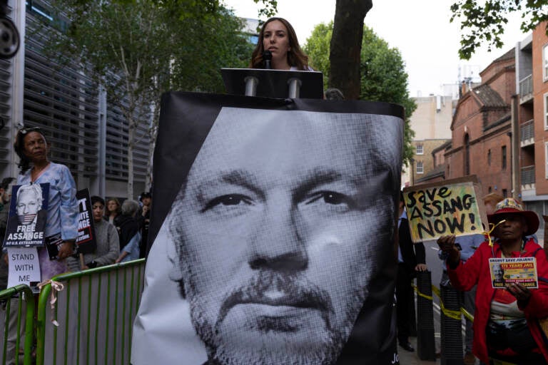 Stella Assange, wife of WikiLeaks founder Julian Assange, speaks in front of the U.K. Home Office in London as protesters demand Julian Assange's release on May 17. Home Secretary Priti Patel signed the extradition order on Friday. (Dan Kitwood/Getty Images)