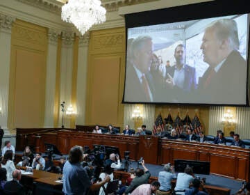 An image of former President Donald Trump talking to his Chief of Staff Mark Meadows is displayed as Cassidy Hutchinson testifies before the House select committee investigating the Jan. 6 insurrection