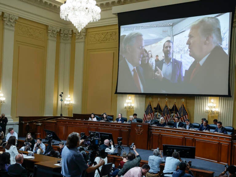 An image of former President Donald Trump talking to his Chief of Staff Mark Meadows is displayed as Cassidy Hutchinson testifies before the House select committee investigating the Jan. 6 insurrection
