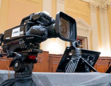 Television crews and technicians prepare the Cannon Caucus Room for Thursday night's hearing by the House select committee investigating the attack of Jan. 6, 2021, at the Capitol in Washington, Tuesday, June 7, 2022. (AP Photo/J. Scott Applewhite)