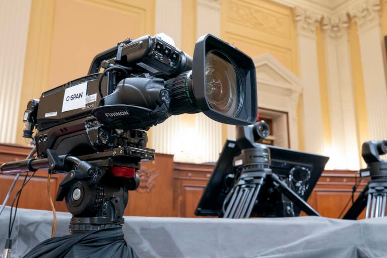 Television crews and technicians prepare the Cannon Caucus Room for Thursday night's hearing by the House select committee investigating the attack of Jan. 6, 2021, at the Capitol in Washington, Tuesday, June 7, 2022. (AP Photo/J. Scott Applewhite)