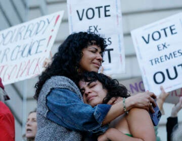 Mitzi Rivas, left, hugs her daughter Maya Iribarren during an abortion-rights protest at City Hall in San Francisco