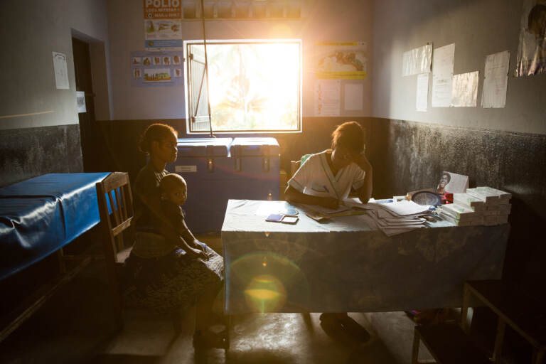 A patient talks with a nurse at a traveling contraception clinic in Madagascar run by MSI Reproductive Choices, an organization that provides contraception and safe abortion services in 37 countries. The group condemned the overturn of Roe v. Wade and warned that the ruling could stymie abortion access overseas. (Samantha Reinders for NPR)