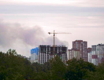 Smoke rises after Russian missile strikes in Kyiv, Ukraine, Sunday, June 5, 2022.