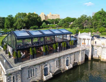 Aerial view of the pavilion on Mill House Deck at the Fairmount Water Works on a sunny day.