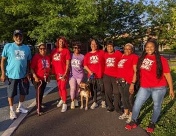 The We Walk PHL group at Lanier Playground in Grays Ferry meets three mornings a week at 6:30 a.m. They call themselves the 'phenomenal, elegant Lanier walkers.' (Elizabeth Estrada/WHYY)