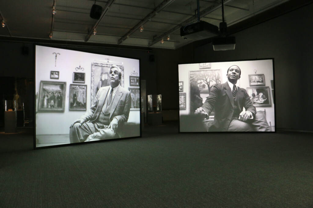 Two video panels side by side show Albert Barnes in one, and Alain Locke in another, in black and white.