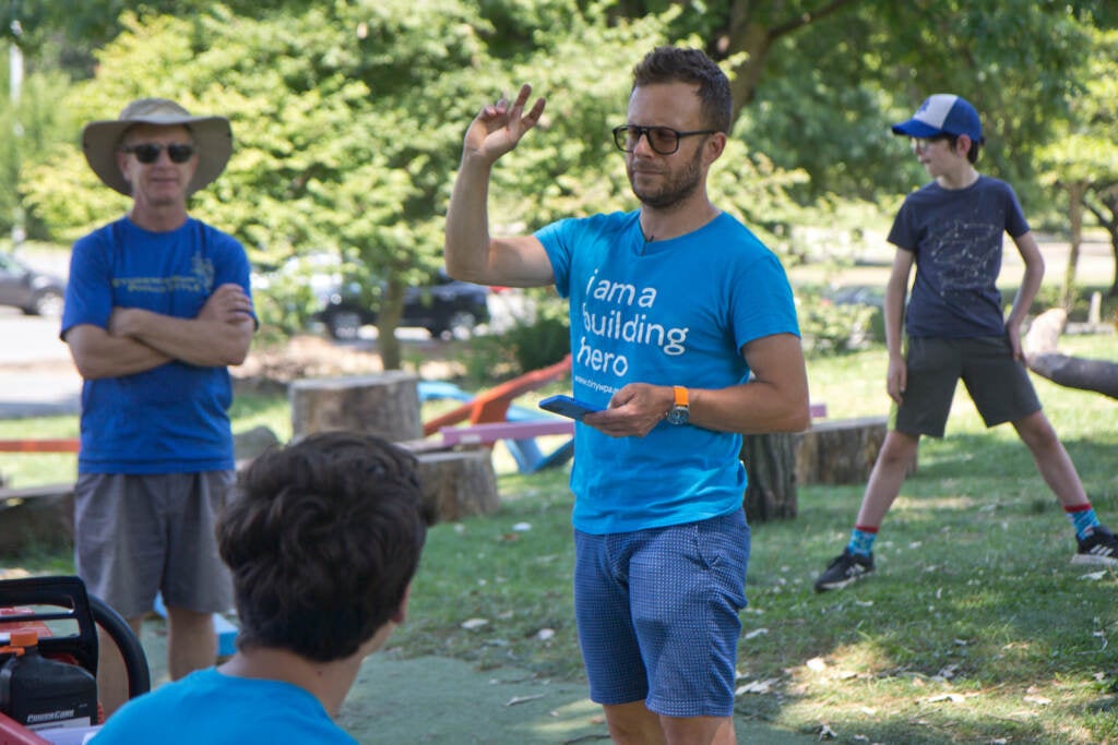 Alex Gilliam directs a community build team at FDR Park