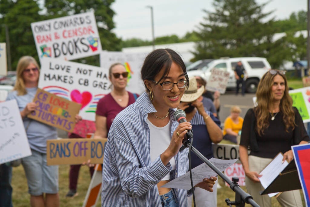 Sarah Zhang speaks at a rally outside of Central Bucks School District