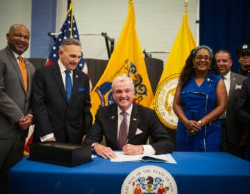 Governor Murphy signs legislation creating a system of licensing for law enforcement on Thursday, July 21, 2022. (Edwin J. Torres/NJ Governor’s Office).