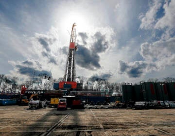 In this March 12, 2020, file photo, the sun shines through clouds above a shale gas drilling site in St. Mary's, Pa. (AP Photo/Keith Srakocic, File)